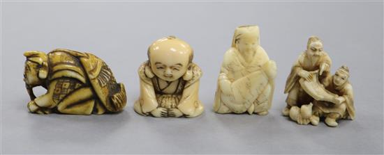 A Japanese ivory group of two figures and three other figures widest 4.5cm